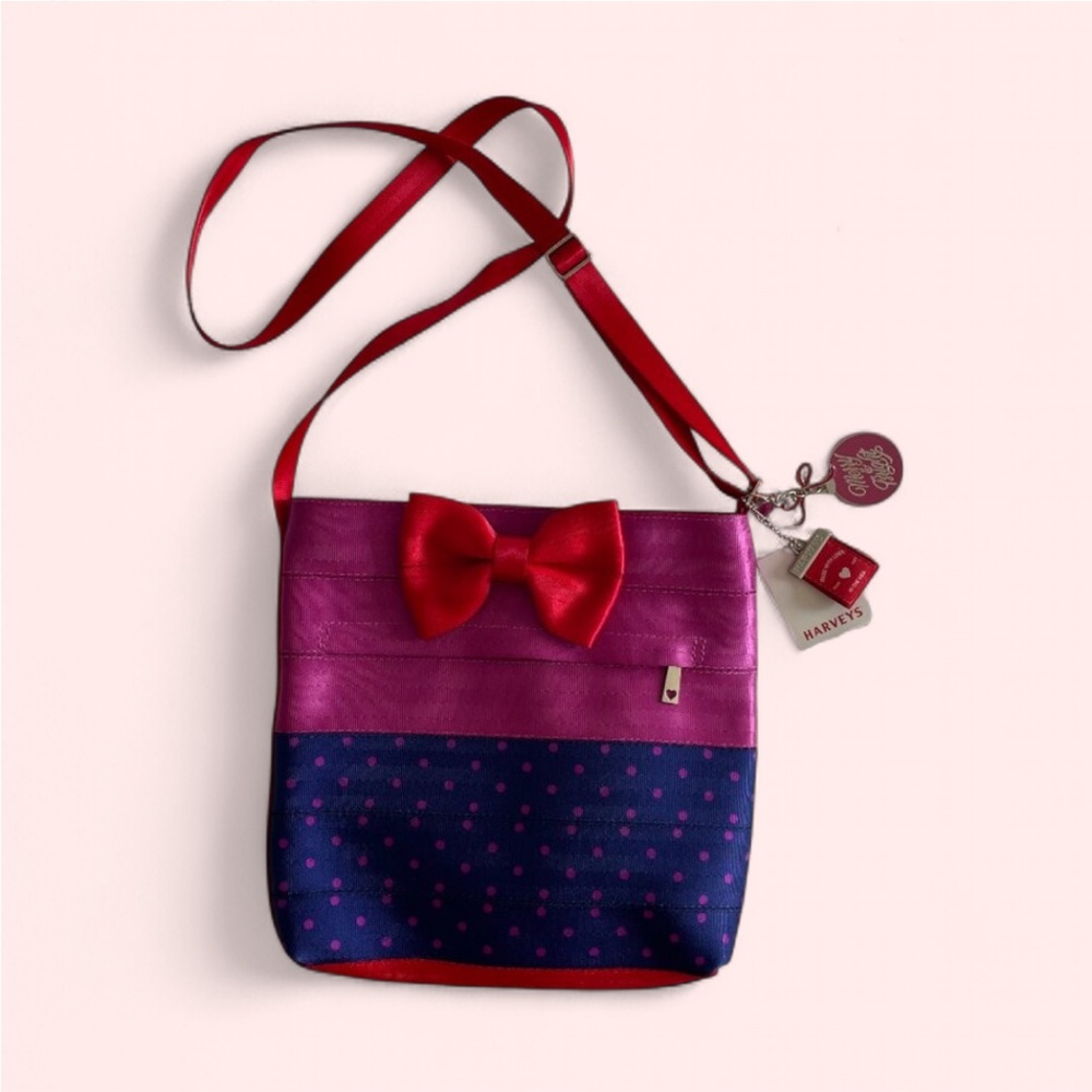 NWT HARVEYS (Holiday Edition) Merry & Bright Bow Purple Streamline Crossbody Bag